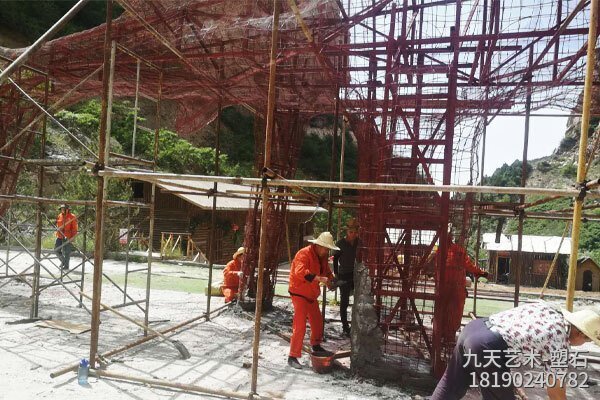 生態(tài)園經(jīng)典水泥仿真樹大門制作案例